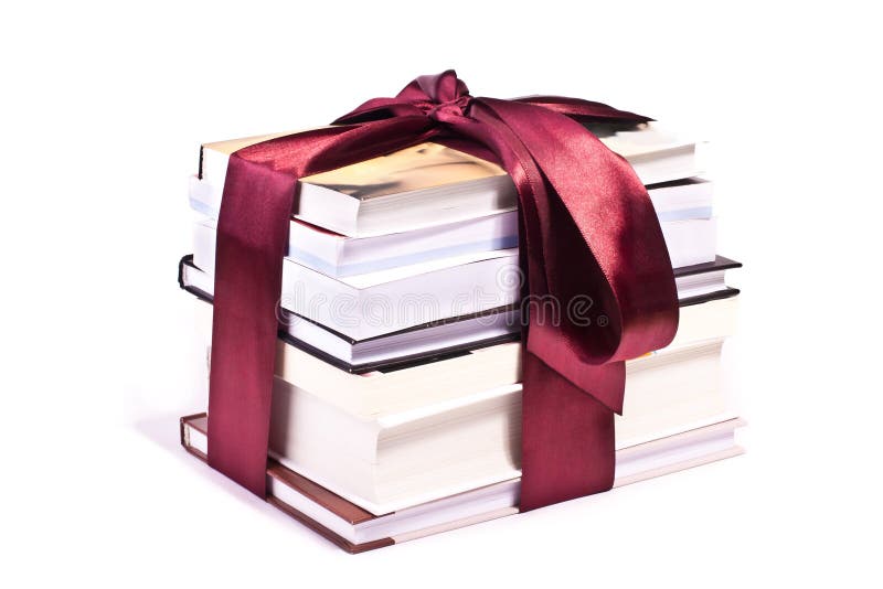 Pile of gift books tied up with red ribbon