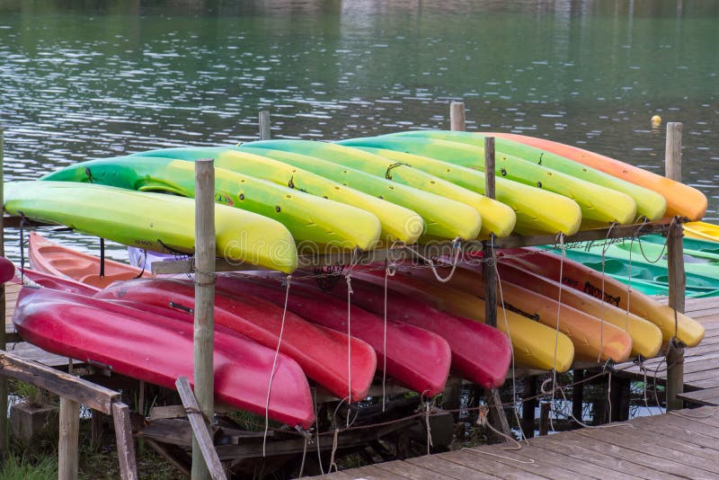 Pile of kayak store outdoor on leisure base in nature. France royalty free stock image