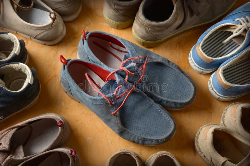 Pile of Men`s Shoes on Wooden Table Stock Photo - Image of classic ...