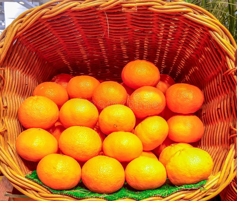 Pile of Orange Fruit in the Big Basket Used As Template Stock Photo
