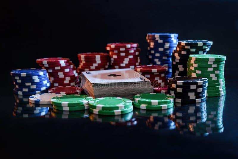 Pile of Playing Cards with Colorful Poker Chips Stock Photo Image of