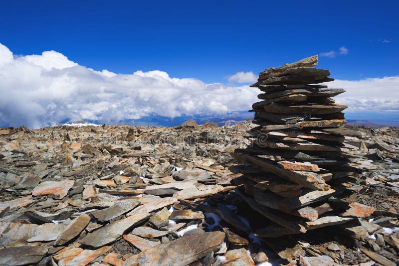 Pile of rocks stone in mountains. Pyramid of stones.