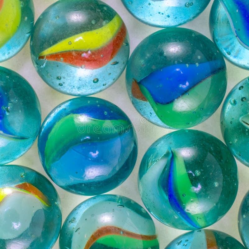 Pile of Some Little Rubber Balls with Colorful Patterns Inside Them