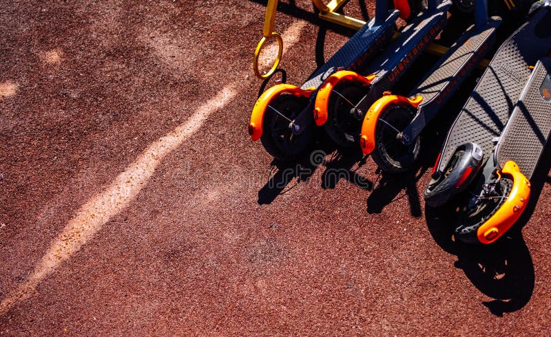 A pile of kick scooters on a road stock images A pile of kick scooters on a road stock images