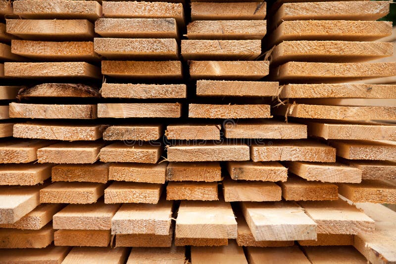 Selection of timber material - planks freshly sawn. Selection of timber material - planks freshly sawn