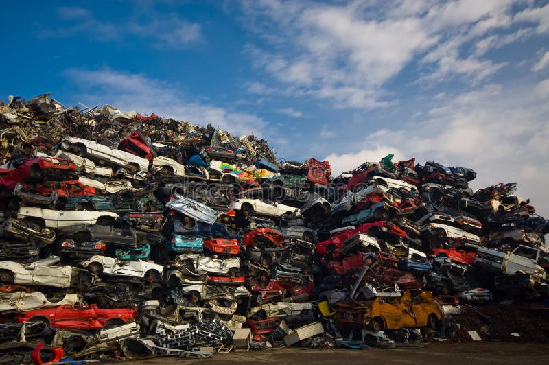 A lot of used cars in the junkyard. A lot of used cars in the junkyard