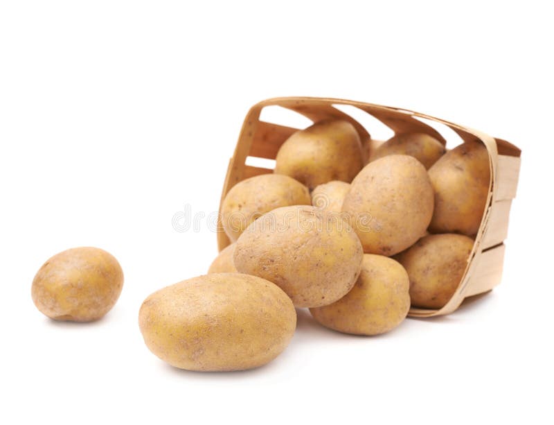 Pile of washed potatoes in a wooden basket