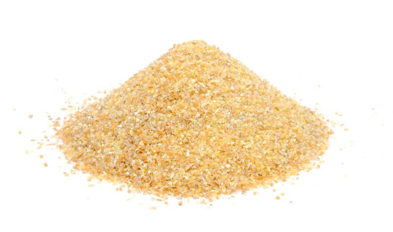 A pile of wheat groats (bulgur) isolated on a white background