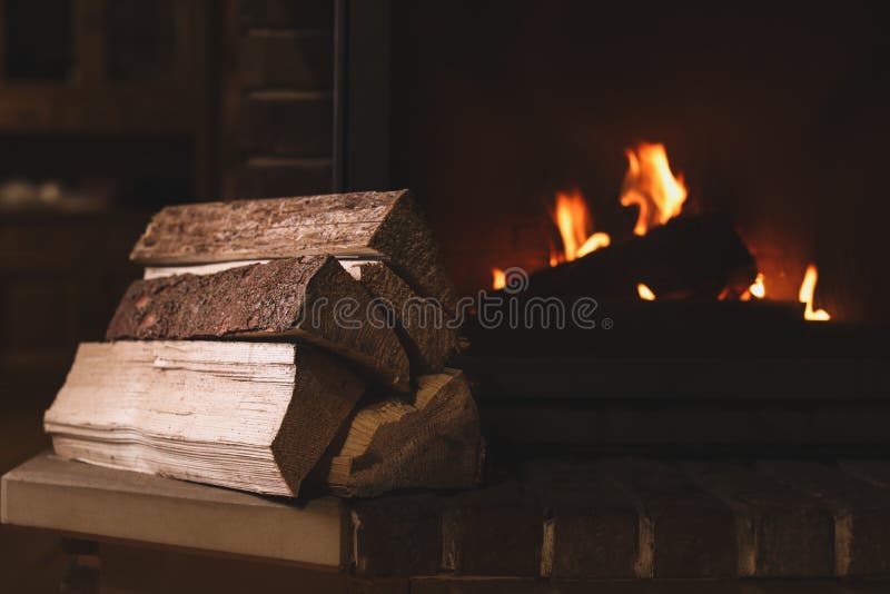 Pile of wood near fireplace. Winter vacation