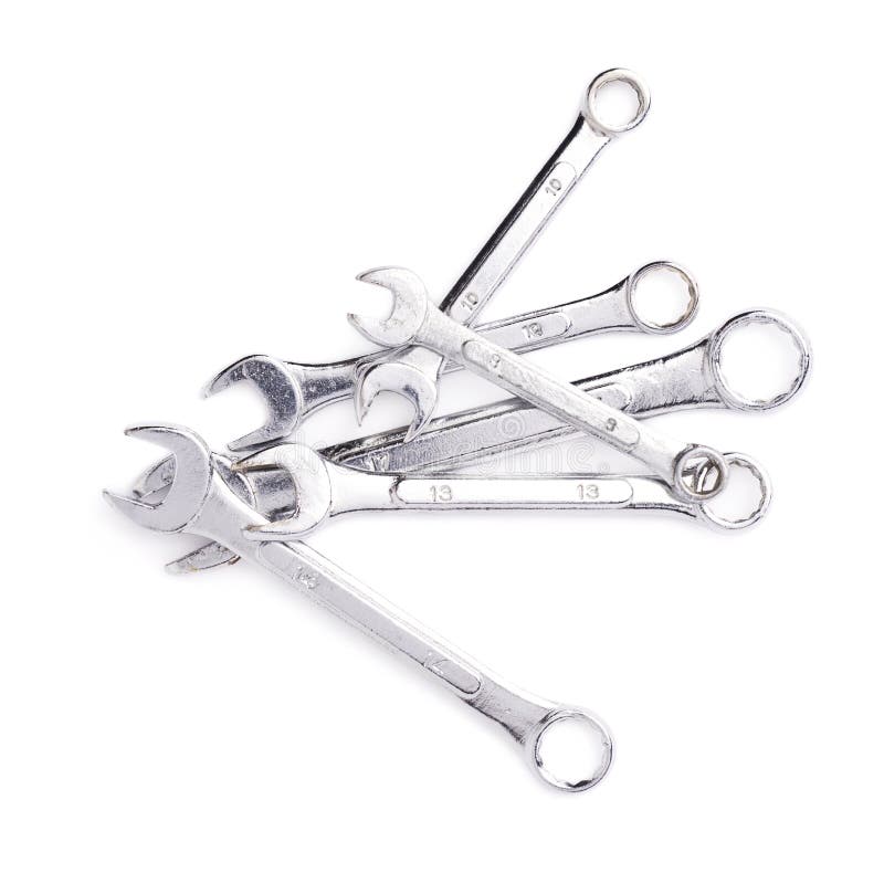 Pile of wrenchs metal instruments isolated over white background royalty free stock images