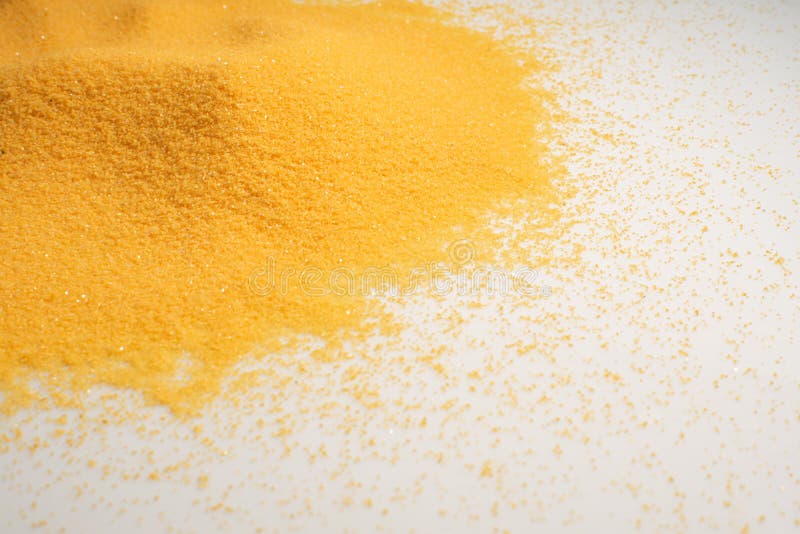 Pile yellow dry desert sand on white background