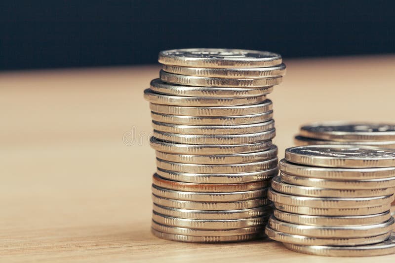 Piles of Coins on Working Table. Creative Photo. Stock Photo Image of