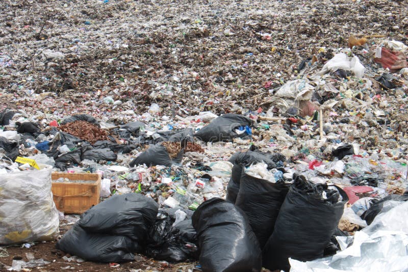 Piles of garbage that form like a mountain stock photo Piles of garbage that form like a mountain stock photo