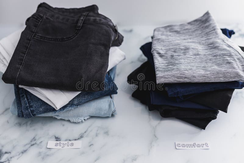 Piles of Jeans and Pants Being Sorted into Style Vs Comfort Categories, Decluttering and