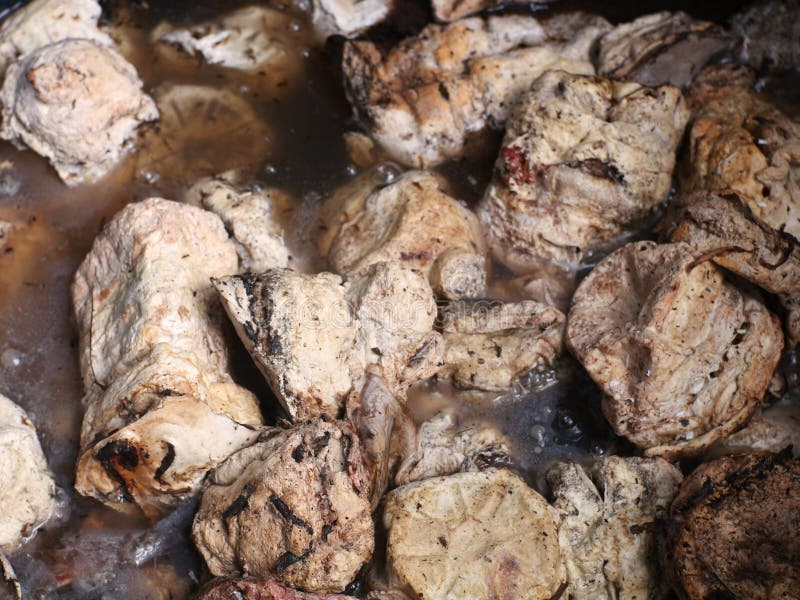 Piles of Rubber Sap from Tapping Rubber Trees that are Put into Water