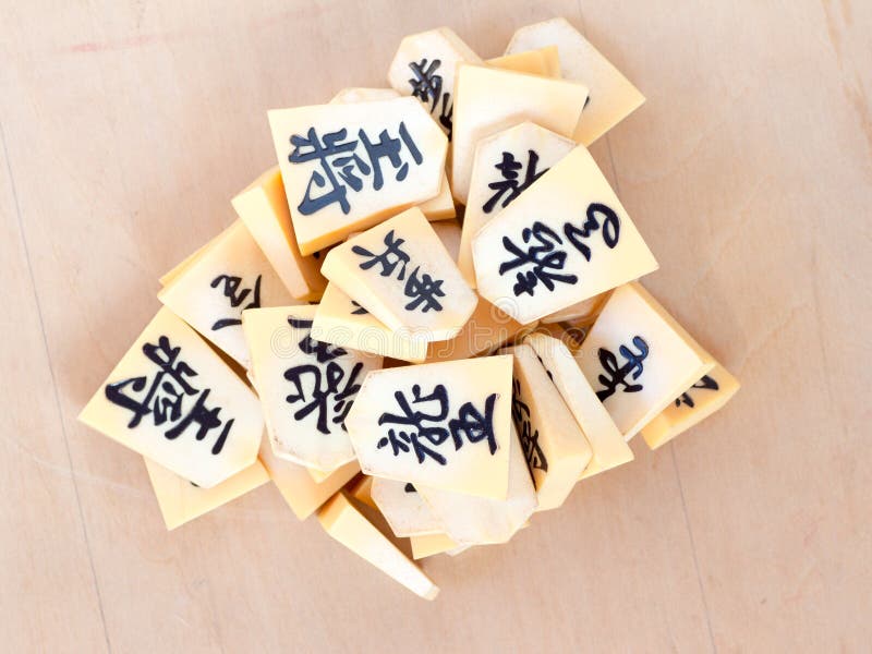 Uma Pilha De Peças De Xadrez Japonesas Chamada Shogi, Também