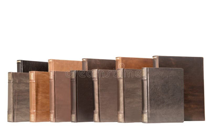 Pilha dos livros velhos isolados no fundo branco foto de stock Pilha dos livros velhos isolados no fundo branco foto de stock