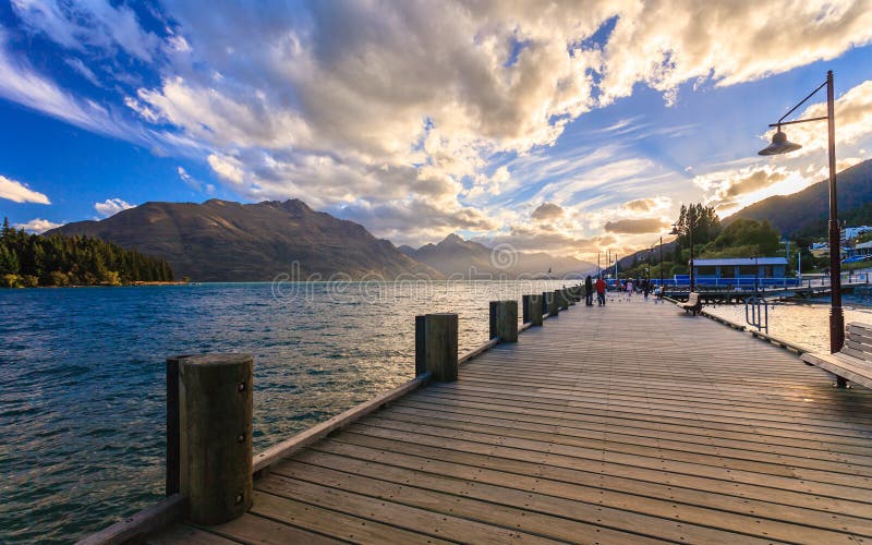 Wooden pier with beautiful lake Wakatipu, Queenstown, New Zealand. Wooden pier with beautiful lake Wakatipu, Queenstown, New Zealand