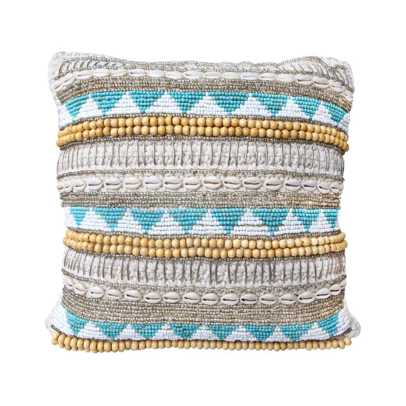 Pillow cushion knitted macrame with shell and beads isolated on white background. Details of modern boho, bohemian