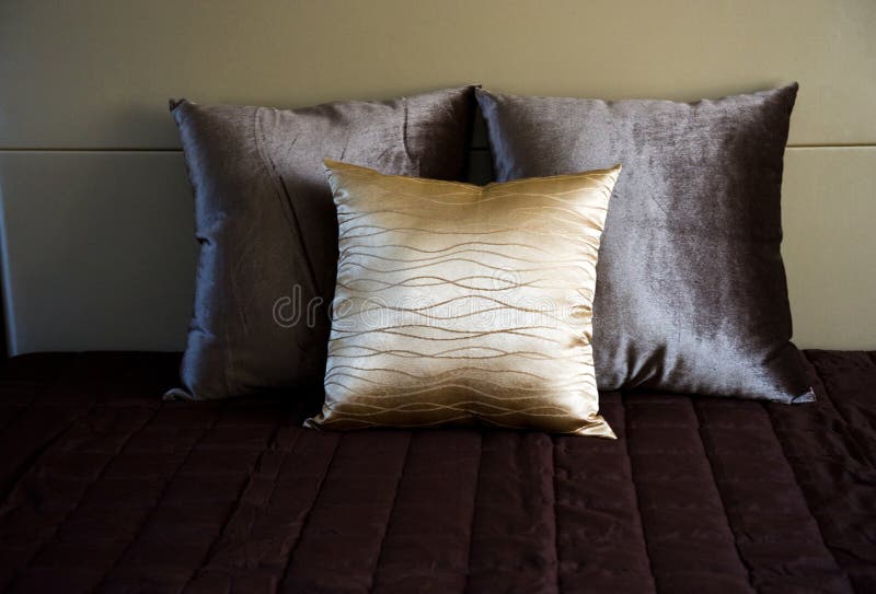 Pillows in bed stock photo. Image of golden, cloth, clean 16775214