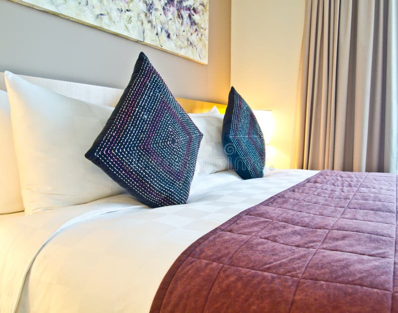 Pillows on a Bed in Hotel Room Stock Image Image of indoors, bedroom