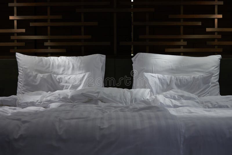 Pillows and Bed Sheet in the Room of Hotel Stock Image - Image of