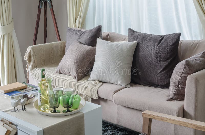 Pillows and Blanket on Earth Tone Sofa Stock Photo Image of home