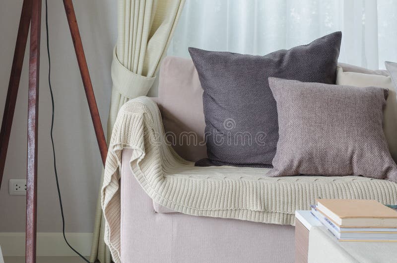 Pillows and Blanket on Earth Tone Sofa Stock Image Image of couch