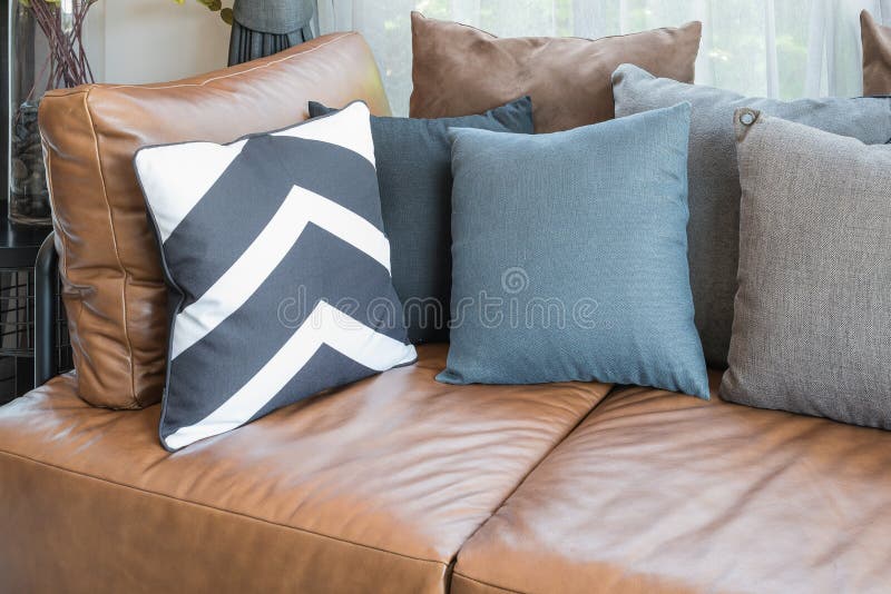 Pillows on Brown Leather Sofa I Stock Image Image of chair, floor