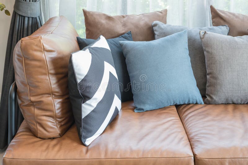 Pillows on Brown Leather Sofa Stock Photo Image of decor, light 62629216