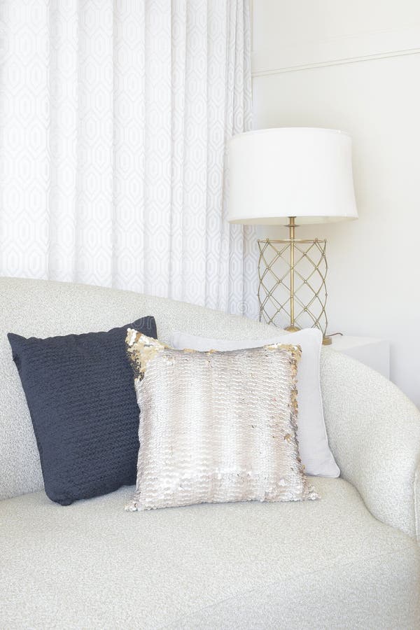Pillows at Corner of Round Shape Sofa in Living Room Stock Image