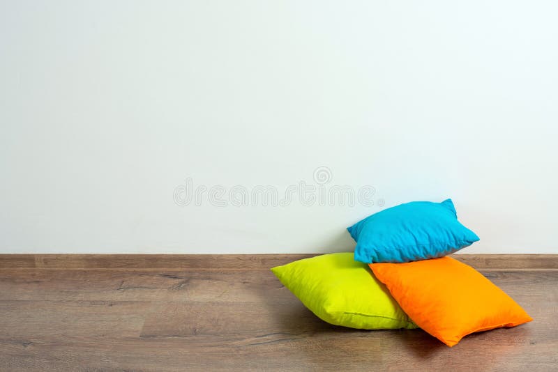 Pillows on floor stock photo. Image of apartment, domestic 67430022