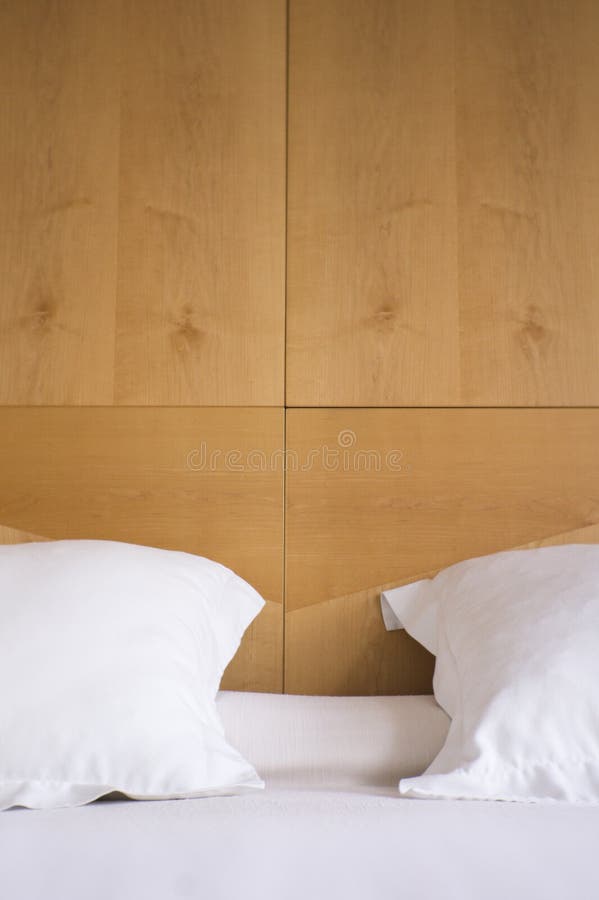 Pillows with White Covers on Luxury Hotel King Size Bed Stock Image