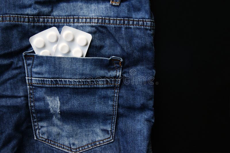 Pills in the back pocket of jeans