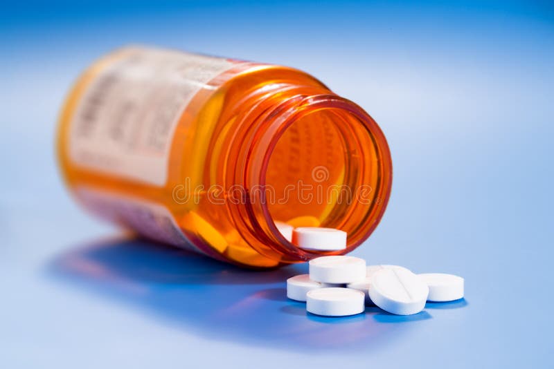 Pills in a bottle royalty free stock photography