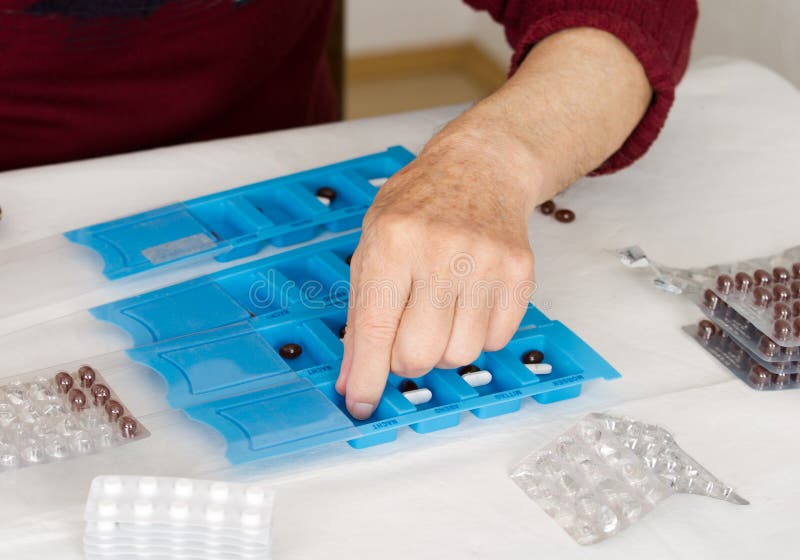 Pills container royalty free stock photo