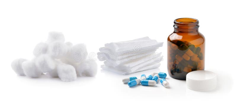 Pills out of bottle and Cotton wool bandage royalty free stock photos Pills out of bottle and Cotton wool bandage royalty free stock photos