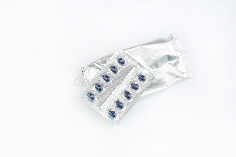 Pills Pack with Filled Retort Foil Pouch Bag Packaging Stock Photo