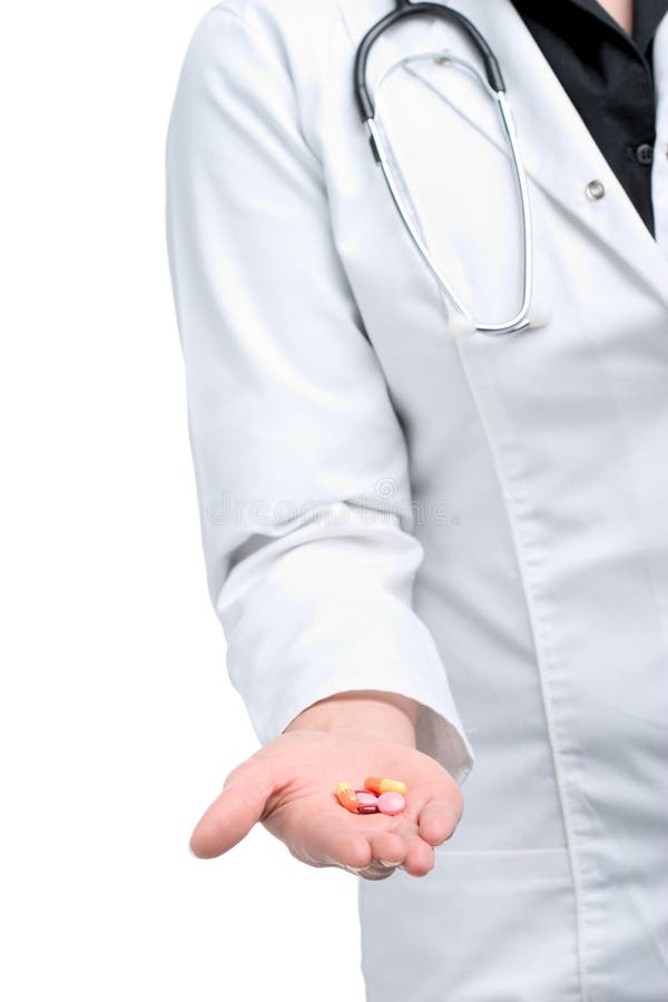 Mid section shot of a woman wearing a lab coat holding pill. Mid section shot of a woman wearing a lab coat holding pill.