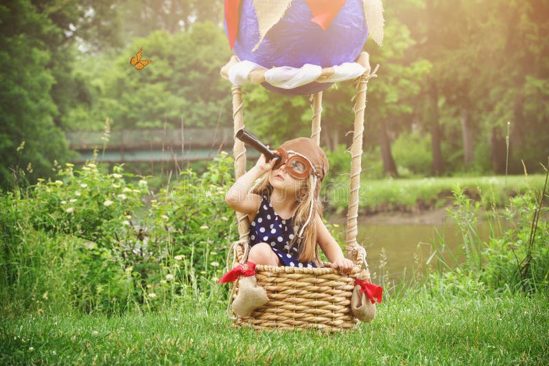 Pilot Girl in Hot Air Balloon Pretending to Travel