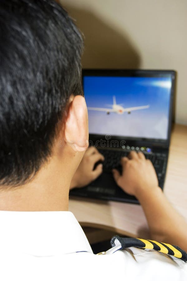 Pilot using a laptop