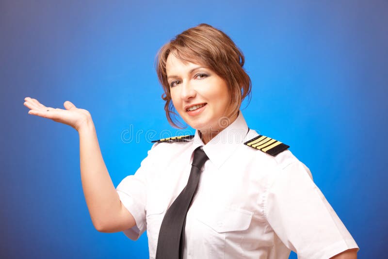 Pilote de compagnie aérienne photographie stock libre de droits Pilote de compagnie aérienne photographie stock libre de droits