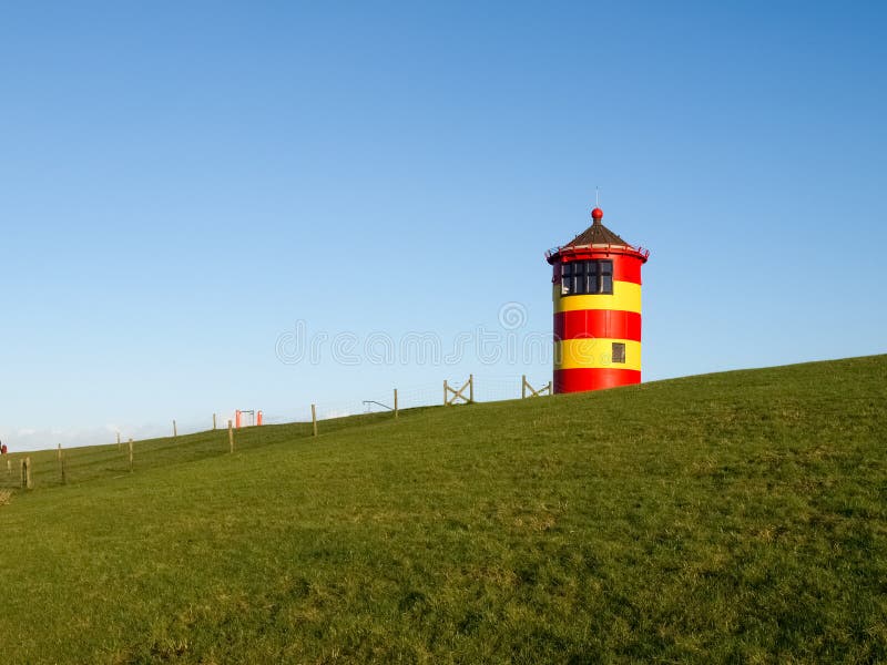 Pilsum, lighthouse at North sea of Germany. royalty free stock image Pilsum, lighthouse at North sea of Germany. royalty free stock image