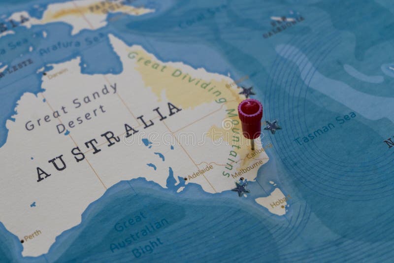 A pin on canberra, australia in the world map stock photography
