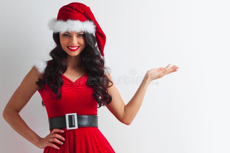 Pin-up Santa girl holding something