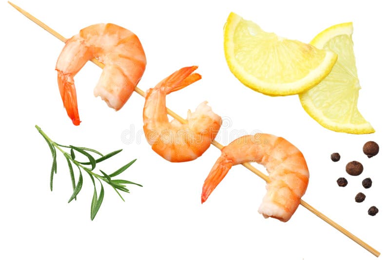 pinchos de los camarones con el limón y el romero aislados en un fondo blanco Visión superior imágenes de archivo libres de regalías pinchos de los camarones con el limón y el romero aislados en un fondo blanco Visión superior imágenes de archivo libres de regalías