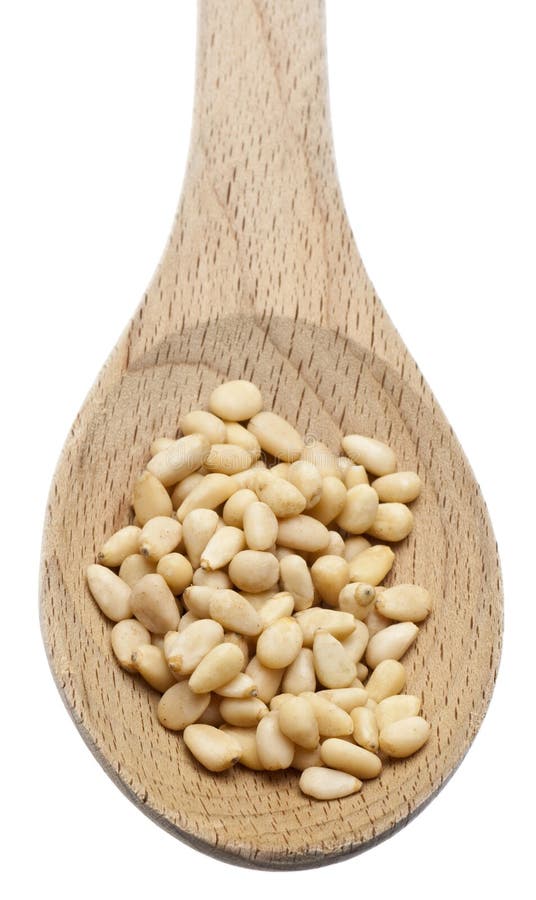 Pine Nut Seeds in a Wooden Spoon