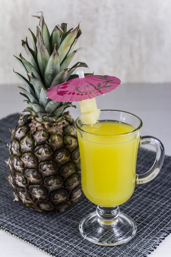 Pineapple juice stock photo. Image of wood, table, yellow 49178984