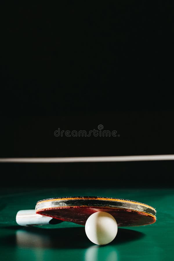 Ping Pong Racket Leaning on Ping Pong Ball Stock Image Image of dark