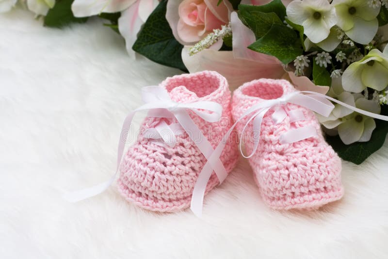 Pink Baby Booties stock image. Image of leaf, childcare 12624275